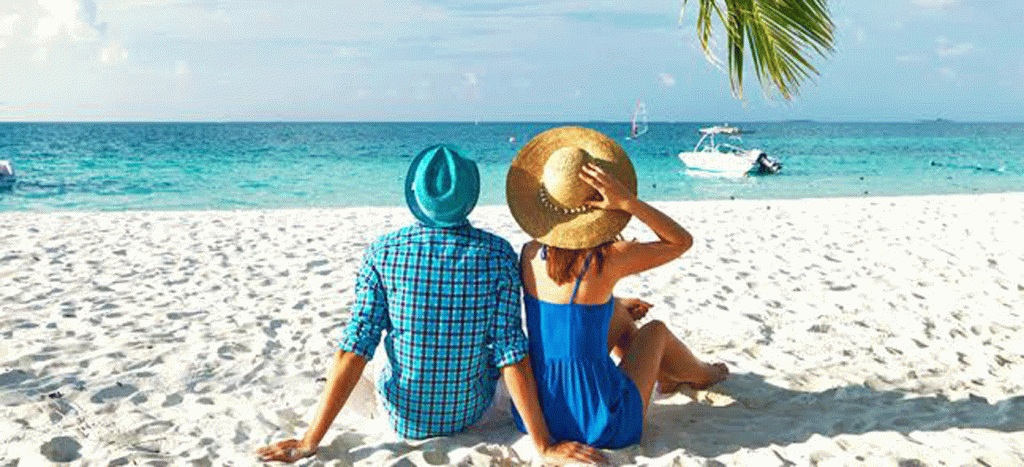 Write a brief, engaging caption for the Zanzibar safari images that highlights the seamless transition from the thrill of a Serengeti wildlife adventure to the serene relaxation of Zanzibar's white-sand beaches. Emphasize that this is the ultimate "bush-to-beach" experience for Italian travelers looking to combine adventure and luxury.